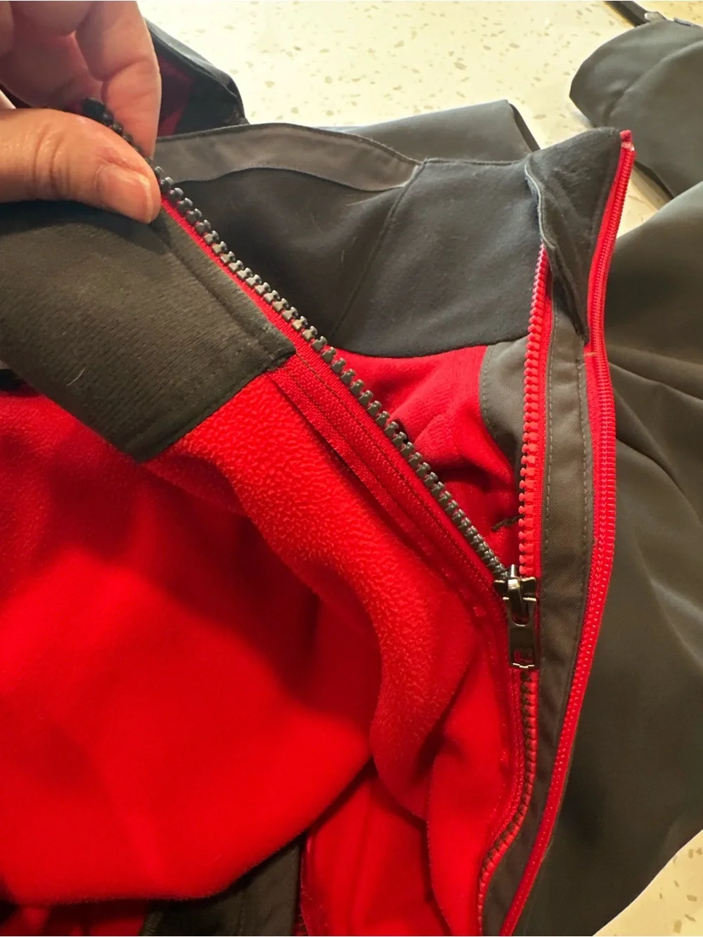 The North Face Men's Gray Softshell Jacket with Red Lining